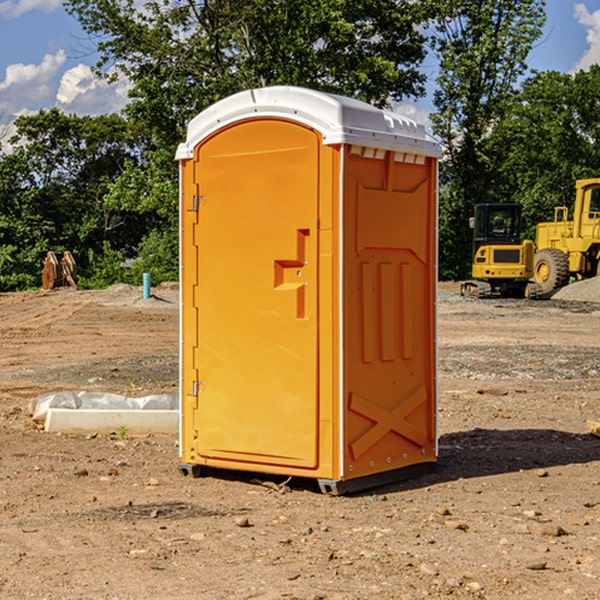 how often are the porta potties cleaned and serviced during a rental period in Omega